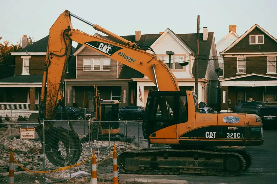 Home Demolition site assessed before work begins