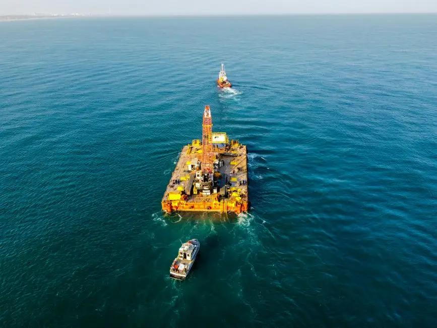 Machinery positioned for underwater demolition