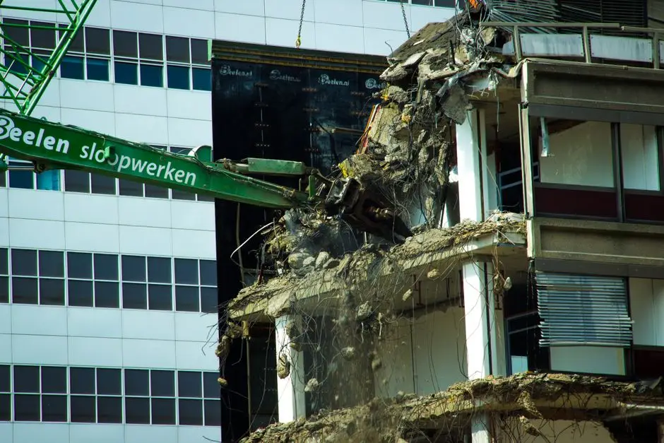 Machinery positioned for commercial demolition