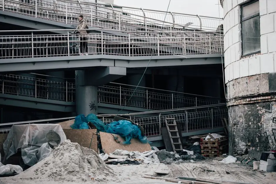 Machinery positioned for concrete steps removal
