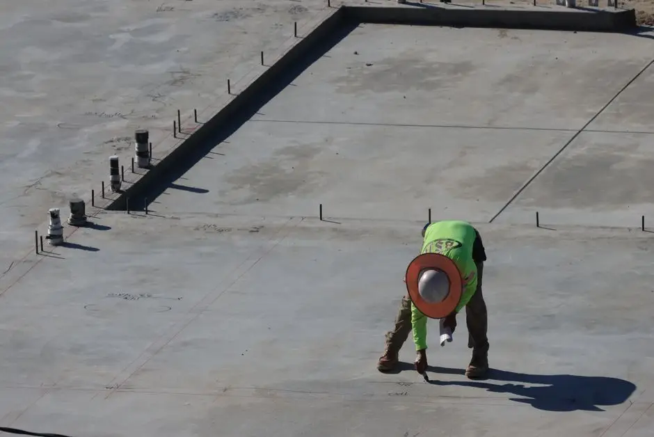 Machinery positioned for concrete slabs removal
